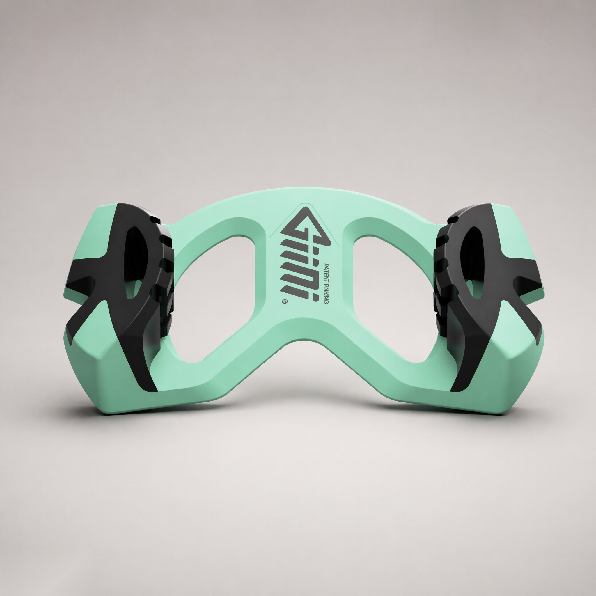 Giini Pyro Alpine Mint snowboard traction device, studio front view with Giini logo