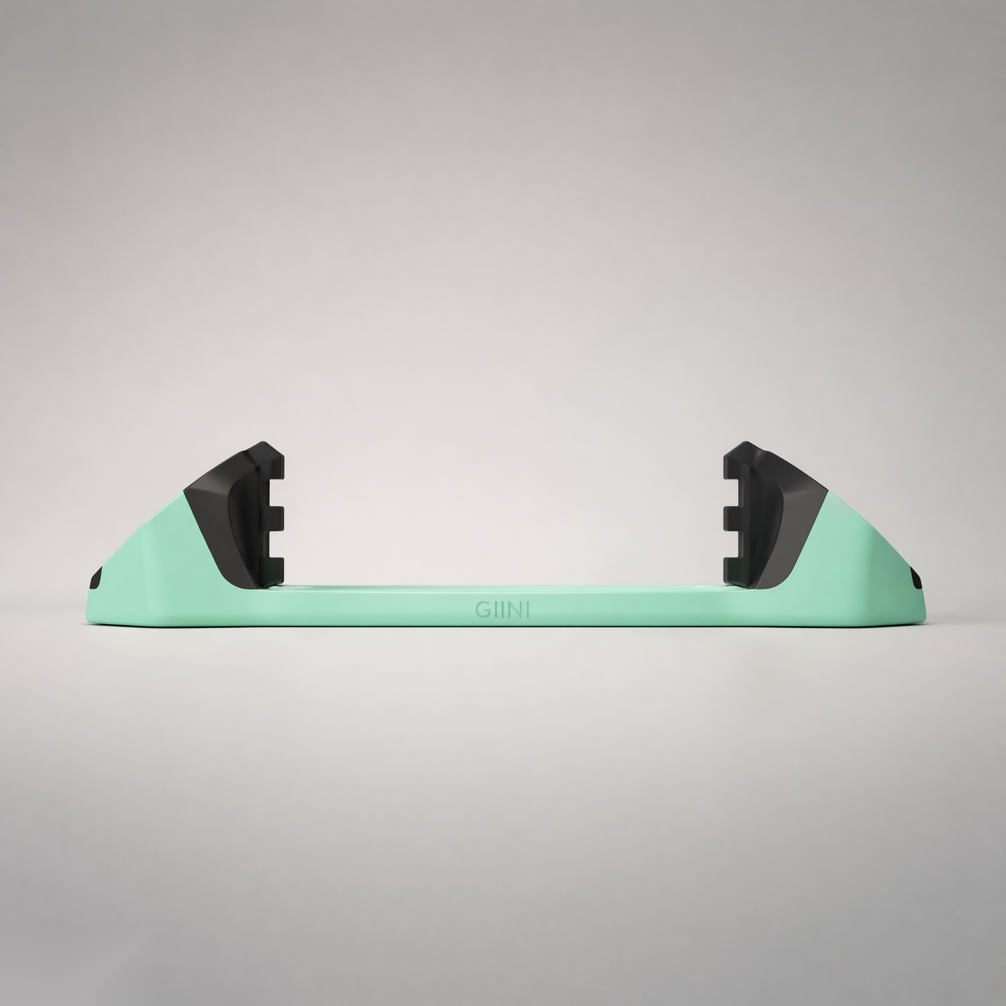 Giini Pyro Alpine Mint mechanical stomp pad, studio rear view showing the black bumpers