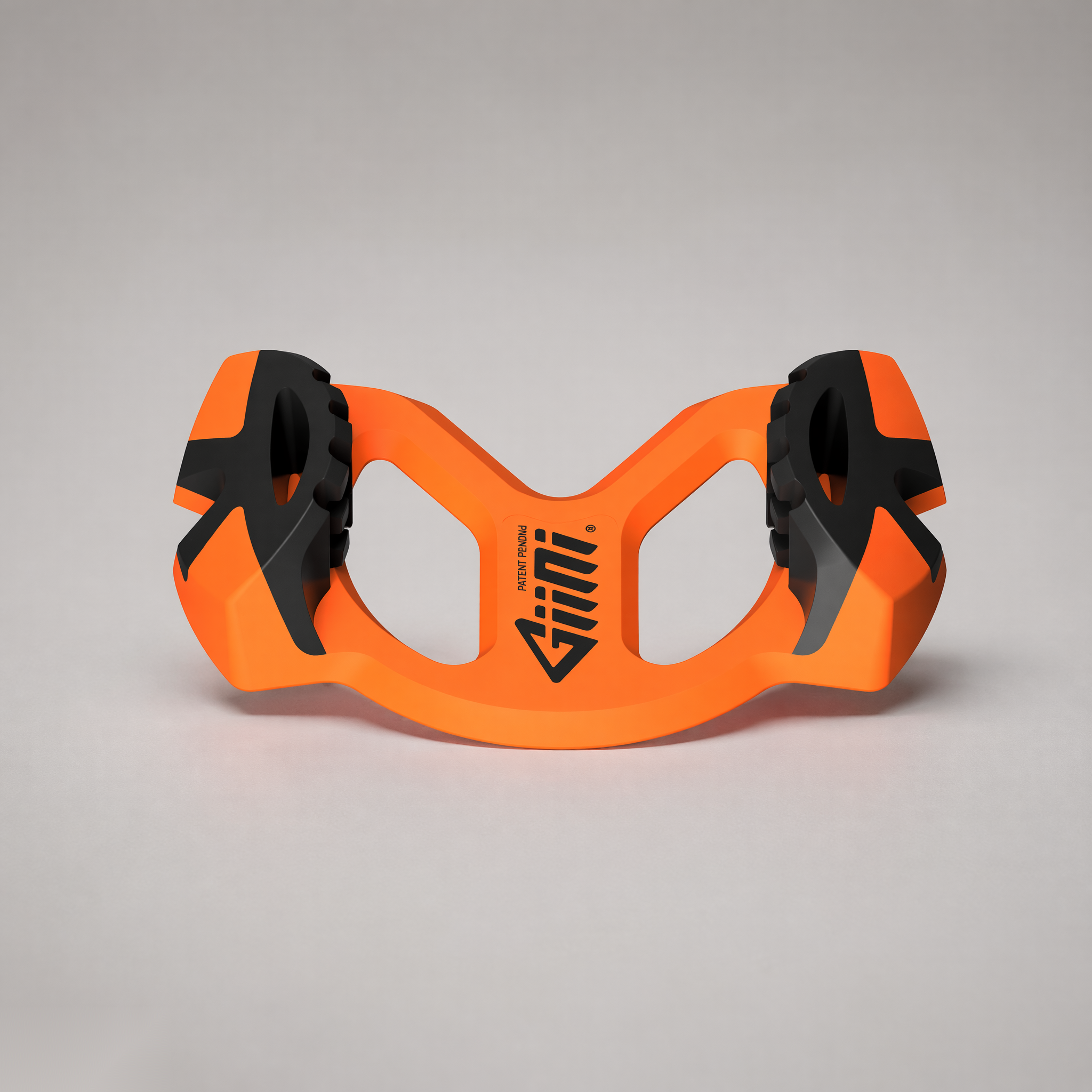 Giini Pyro Blaze Orange, studio three-quarter rear view of the U-shaped chassis