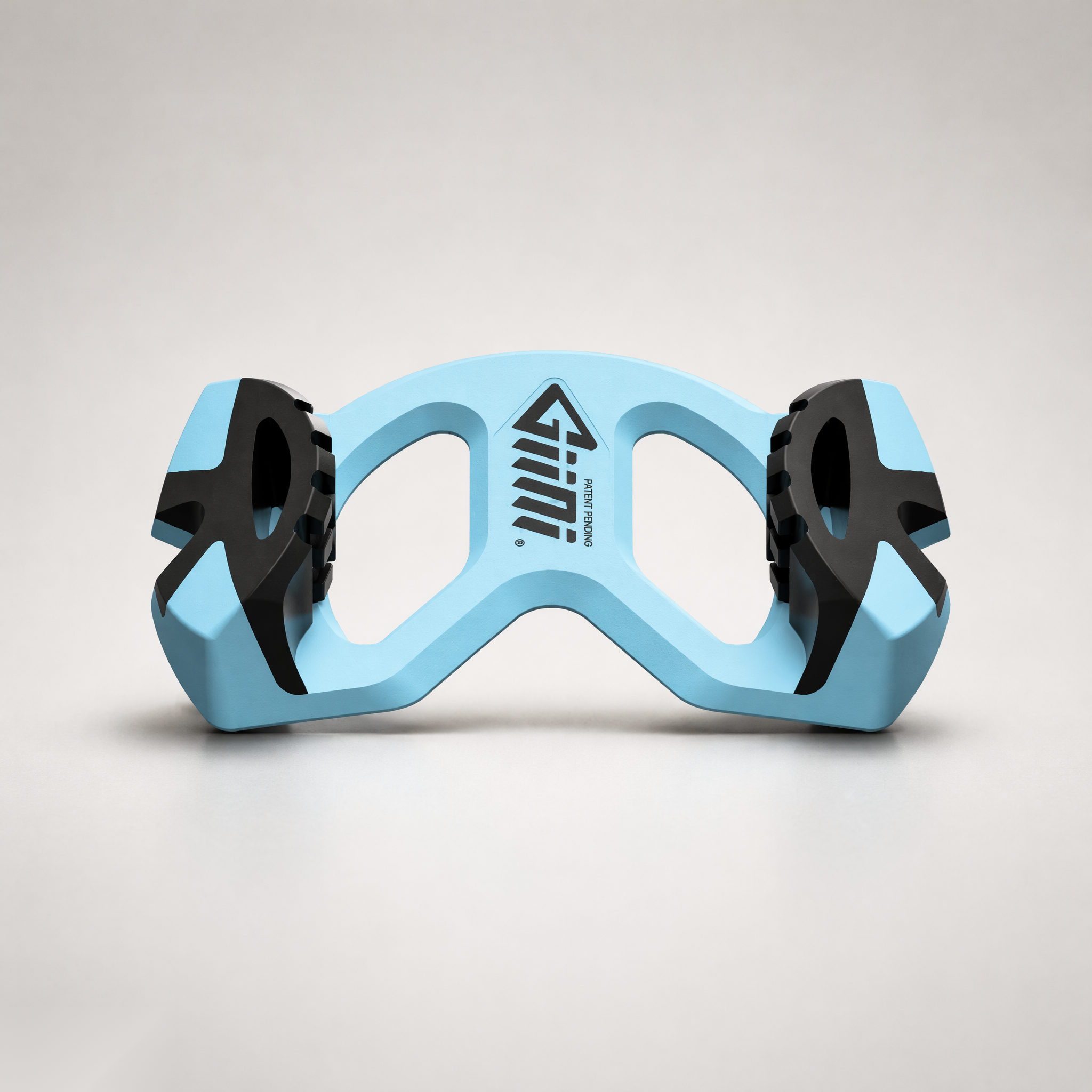 Giini Pyro Glacier Blue snowboard traction device, studio front view with Giini logo