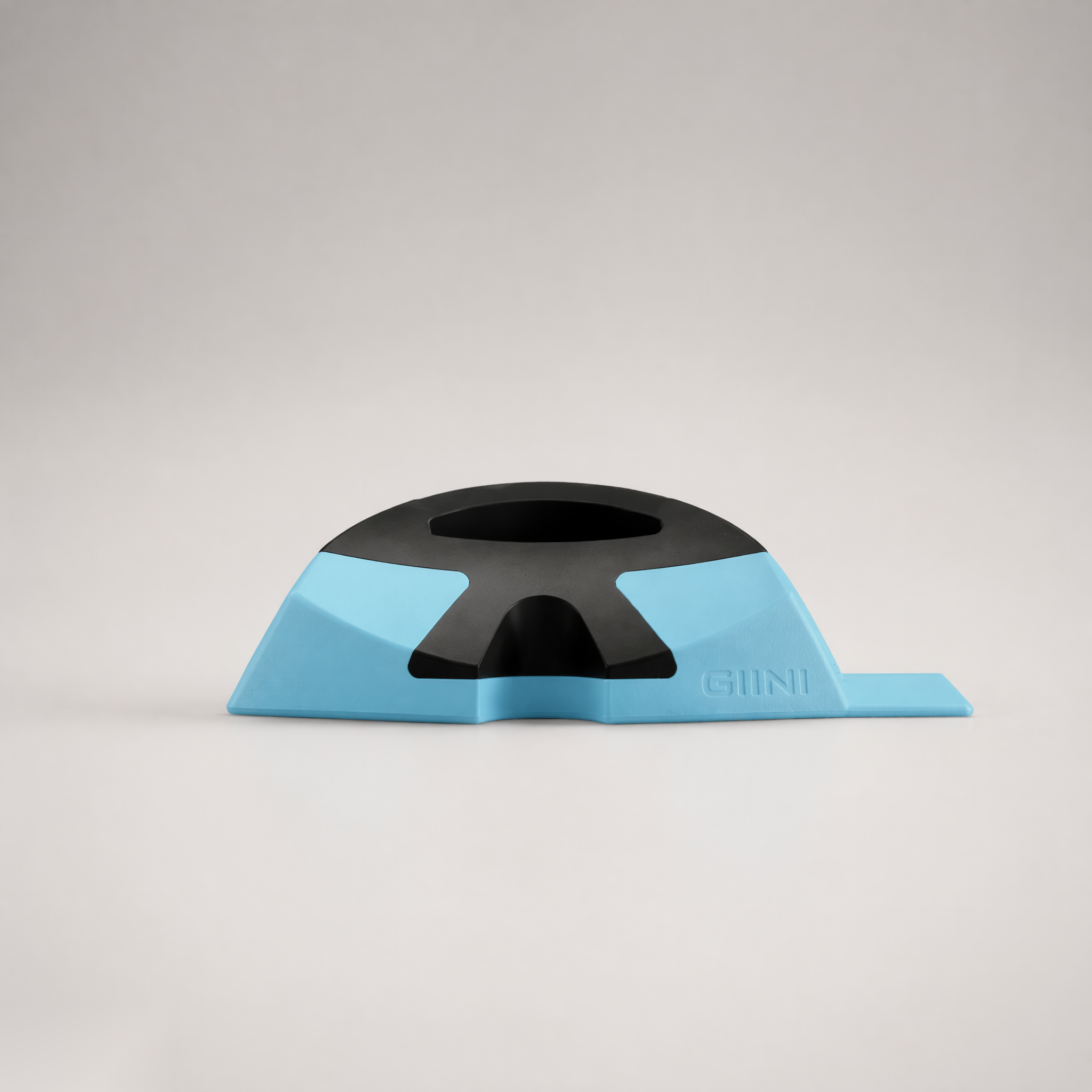 Giini Pyro Glacier Blue ice blue mechanical stomp pad, studio side profile view