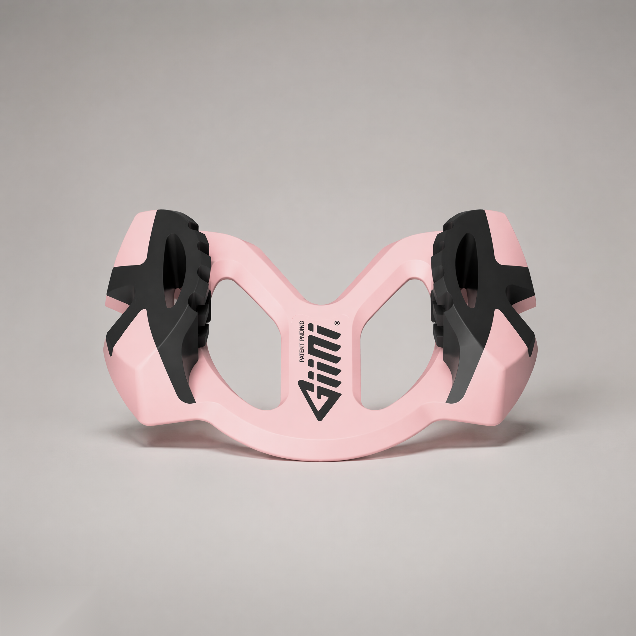 Giini Pyro Powder Pink, studio three-quarter rear view of the U-shaped chassis