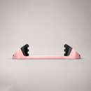 Giini Pyro Powder Pink mechanical stomp pad, studio rear view showing the black bumpers