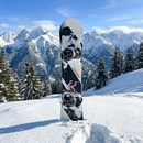 Giini Pyro Alpenglow mechanical stomp pad mounted on a snowboard topsheet